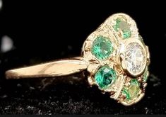 Gorgeous Vintage natural round Diamond emerald in 14k rose gold  ring circ 1940'srare ring is finely crafted in 14k rose  gold and setcenter natural round cut  diamond  weight 0.55ct SIZE 4.5mm  SI1-Hside set 6 surrounds  natural green emerald weight  0.75ctvery lively,sparkly stone.clean.Ring size 6.5This tremendous old vintage ring is in a very good condition.Retail value $4,500 netAppraisal available Vintage 14k Gold Emerald Ring With Brilliant Cut, Antique 14k Stamped Round Emerald Ring, Vintage Emerald Ring With Brilliant Cut For May Birthstone, Antique Emerald Ring For May Birthstone, Victorian Style Green Diamond Ring, Green Victorian Diamond Ring, Vintage 14k Gold Emerald Ring, Victorian 14k Gold Round Emerald Ring, Vintage Diamond Ring With Center Stone For May Birthstone