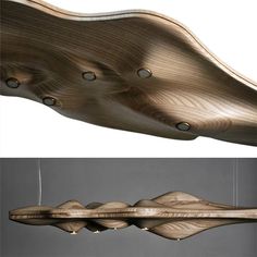 two different views of a light fixture with wood grained finish on the underside and side