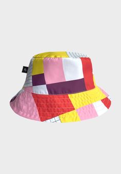 Our bucket hats are back this season! We have different types of prints in water-proof fabric, from the brightest print to the most sober monochromatic style. Our hats have a classic design, they are reversible, and their fabric is soft and breathable for a perfect and comfortable fit. Choose your favorite and go for a walk! DETAILS: - Double sided hat  - Windbreaker - Antifluid - Solar protection - Water resistant - 100% polyester Would you like to know more about our products? Please head to pluvorain.com If you like to know more about our fabrics: https://www.lafayettesports.us/technologies-1 PLUVO: Our initial goal was to create distinctive, reliable, and durable outdoor clothing. At this point, we are pleased to say that our products have been recognized not only for their functionali Cheap Fun Yellow Bucket Hat, Cheap Multicolor Bucket Hat For Festivals, Multicolor Bucket Hat For Summer Streetwear, Multicolor Bucket Hat For Spring Outdoor, Spring Multicolor Bucket Hat For Outdoor, Retro Summer Hats For Outdoor Activities, Summer Outdoor Hat With Graphic Print, Multicolor Outdoor Bucket Hat, Casual Multicolor Bucket Hat For Streetwear