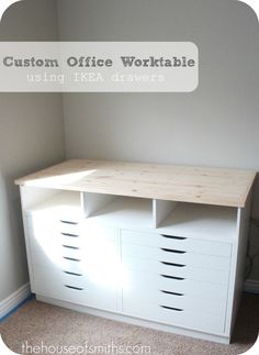 an office worktable with drawers in the corner