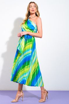 A printed woven midi dress featuring one shoulder neckline, pleated top and skirt, self sash tie and side zipper closure Details: Self : 97% Polyester 3% SpandexLining: 100% Polyester Size & Fit - Model is 5`8" And Wearing Size Small- Measurements Taken From Size Small- Approx. Length: 53" Green One Shoulder Midi Dress For Spring, One Shoulder Summer Dress With Tie Waist, Spring One-shoulder Dress With Tie Waist, One-shoulder Tie-waist Summer Dress, Green One Shoulder Midi Dress For Summer, Green One-shoulder Pleated Dress, Green Pleated One-shoulder Dress, Green One-shoulder Midi Dress For Spring, Summer One-shoulder Belted Dress