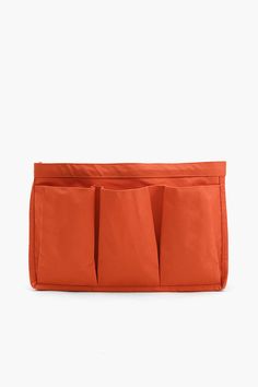 an orange bag with three pockets on it