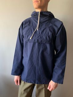 Anorak Jacket / Anorak NOREFJELL / FJELL Anorak / Windproof Jacket / Size S This anorak jacket in good used condition, color faded, several white spots (please look photo) - one pocket one on the chest  - made in Denmark - ERA - 1980's - brand - Sea Fabricat - zipp - Opti - elasticated cuffs - materials: 67% polyester, 33% cotton - fit size - 48 (fit size S, watch measurements) FLAT Measurements: Shoulders: 62cm Chest: 56cm Sleeve: 53cm Model height and weight reference (cm/kg): 176/68 Pay your attention to that  most antique items have been used and may have minor flaws. Please , read the description carefully and check the measurements! SHIPPING: UkrPosta Airmail Shipping: - Europe: 25$ - 14-31 days (No shipping to Germany!) - United Kingdom: 25$ - 14-31 days  - USA: 25$ - 14-40 days   F Navy Windbreaker With Pockets For Hiking, Navy Hooded Outdoor Jacket With Pockets, Navy Hooded Jacket With Pockets For Outdoor, Navy Outdoor Hooded Jacket With Pockets, Navy Long Sleeve Windproof Windbreaker, Navy Windbreaker For Winter Hiking, Navy Hooded Windbreaker With Pockets, Navy Cotton Windbreaker With Pockets, Navy Long Sleeve Waterproof Windbreaker