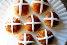 several croissants with white icing on them are arranged in a circle