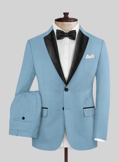 Bring some passion to your wardrobe with our finely tailored Napolean Taj Blue Wool Tuxedo suit. Crafted from wool blend, the luxurious feel of the tuxedo for sure will give you that perfect warmth while the neutral tone will add further depth and character to an otherwise all-black ensemble.  Featuring satin lapel, matching satin covered buttons and gentle texture at its surface, our tuxedo is a subtle fashion-forward take on a traditional tailoring.  Look Includes   Napolean Taj Blue Wool Fabric  Two Button Tuxedo Jacket Style  Notch Lapel  Black Tuxedo Buttons  Single Vent  Three Cuff Buttons  Two Welted Back Pockets on Trousers   Click 'Customize Now' to modify the look if needed.  Jacket is fully lined while the Pants do not have satin lining.  Lining: Viscose; Dry Clean. Subtle Fashion, Grey Tweed Suit, Herringbone Tweed Jacket, White Linen Suit, Green Velvet Jacket, Peaky Blinders Suit, Royal Blue Suit, Blue Chinos, Beautiful Suit