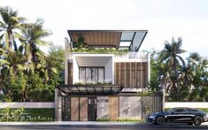 a black car is parked in front of a two story house with balconies