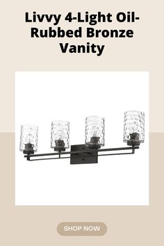 four light oil rubbed bronze vanity fixture with clear glass shades on the top and bottom