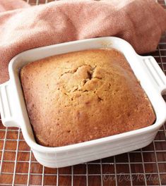 a loaf of bread sitting on top of a cooling rack