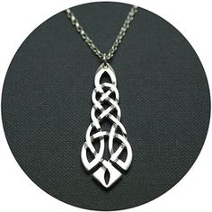 a silver necklace with an intricate design on it