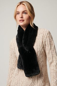 The magical softness of Rex rabbit fur manages the chill of winter. Our knitted Rex rabbit fur scarf adds luxurious texture to a cape or coat, while providing insulation from wind and chill. Wrap this scarf at the neck, and wear it outdoors or in. Or slide the end through the handy slip hole for a styled look that stays put. Elegant Winter Scarves For Cold Weather, Luxury Winter Scarves, Fur Circle Scarf, Rabbit Fur Earrings, Black Fur Scarf, Winter Scarf Animal Print, Black Scarves For Cold Weather, One Size, Jacket Cape, Rex Rabbit