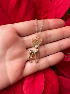 Deer pendant  attached to hypoallergenic hardware. Deer Necklace For Men, Gold Dangle Jewelry For Christmas, Gold Dangle Jewelry For Holiday, Gold Necklace For Party And Holiday, Gold Necklaces For Holiday, Adjustable Gold Holiday Jewelry, Holiday Adjustable Gold Jewelry, Gold Necklace Holiday Gift, Holiday Gold Necklace Gift