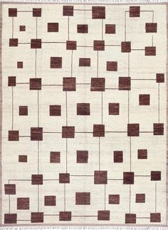 a brown and white rug with squares on it