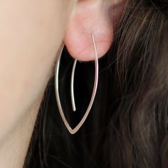 These feather light leaf hoops are a great everyday go-to earring. Easy to wear, and a great gift item, these nature inspired simple earrings are the epitome of boho minimalist style, and can really be worm with anything any time. Approximately 1.5 inches long Available in sterling silver, 14k yellow and rose gold fill, as well as 14k solid yellow gold. All Rebecca Haas Jewelry is handcrafted by me in my Southern Vermont Studio from recycled and ethically sourced materials. Minimalist Jewelry Silver, Winter Leaves, Boho Minimalist, Feather Light, Simple Earrings, Minimalist Style, Minimalist Jewelry, Gift Item, Nature Inspired