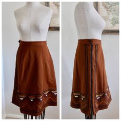 "Beautiful and unique vintage skirt, hand-sewn locally in St. Louis - estimated 1970s/80s. This skirt is in excellent vintage condition, there is some noted wear around the side zipper, as well as pilling. Estimated size S/M. Please see measurements for accurate fit: Length: 24\" Waist: 25\" Hips: 38\" Please message me with any questions about this item. Thank you for visiting BugB! v i n t a g e b o t t o m s https://www.etsy.com/shop/BugBVintage?section_id=26872169 v i s i t t h e s h o p www Vintage Knee-length Brown Skirt, Vintage Brown Knee-length Skirt, Vintage Knee-length Lined Skirt, Retro Brown Flared Skirt, Retro Brown Skirt, Retro Brown Mini Skirt, Vintage Cotton Brown Skirt, 1970s Fitted Lined Skirt, 70s Skirt