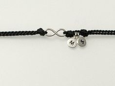 Tiny infinity cord bracelet with dangle initials D E T A I L S ✦ infinity charm: 4x10mm ✦ available in: silver   ✦ cord colors available: black, white, red, blue, light blue, pink, beige, green, purple, yellow and grey. L E N G T H ✦ adjustable with a sliding knot for a perfect fit M A T E R I A L ✦ cord: silk  ✦  925 solid sterling silver N O T E S 📌 19bis wants to make sure every customer is satisfied with their purchase. Please let us know if you have any   questions, we are always available to help! 📌 Please verify the size of the item you are purchasing, as they can appear larger on screen. 📌 For international orders, please note that 19bis is not responsible for any customs and tax fees. Every country has different regulations, please check tax regulations in your country before p Adjustable Infinity Friendship Jewelry, Adjustable Infinity Jewelry For Everyday, Adjustable Nickel-free Sterling Silver Friendship Bracelets, Adjustable Sterling Silver Braided Bracelets For Friendship, Silver Adjustable Friendship Bracelet For Best Friend, Adjustable Silver Friendship Bracelet For Best Friend, Initials Jewelry For Friendship, Adjustable Charms Friendship Bracelets, Adjustable Infinity Jewelry For Best Friend Gift