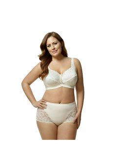 The perfect everyday bra, this pretty style is made with scalloped floral lace cups with a hidden sling that provides great support. Medium coverage will hold you in without sacrificing style. Adjustable straps Nylon/spandex | Plus Size Women's Stretch Lace Softcup Bra by Elila in Ivory (Size 46 F) Underwire Nursing Bra With Lace Trim, Full Coverage Lace Nursing Bra With Delicate Lace, Cream Full Coverage Bra With Removable Pads, Full Coverage Cream Bra With Removable Pads, Cream Lace Bra With Lace Trim, Beige Lace Bra With Lace Closure, Beige Lace Bra Comfortable, White Full Coverage Lace Bra, Cream Lace Underwire Bra