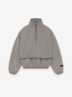 Inspired by the layered looks of the 90s, the Kids Essentials mockneck is made in core fleece and covered with a stretch nylon shell. The piece is designed with volume to create a round, cropped silhouette. Details include halfzip mock neckline, side seam pockets, and elastic binding at the cuff and waist hem. New minimalist branding is seen in the rubberized Essentials Fear of God black bar on the sleeve.  Sizing: Model wears a size 8 Clothing Design Hoodie, Hoodie Minimalist, Minimalist Branding, Fleece Dress, Black Bar, Fear Of God, Mock Neckline, Knit Hoodie, Mock Neck Sweater