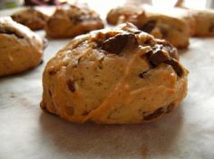 chocolate chip cookies on a baking sheet ready to be eaten