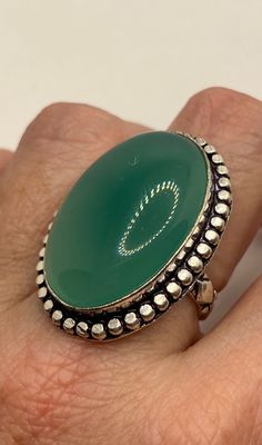 Large green onyx Ornate German Silver Vintage ring, does not tarnish Size 7 can be re sized, my jeweler charges a $20 fee All rings are shipped in a nice gift box. Check out our over a THOUSAND great reviews Engraving is $4 per letter and is not always perfect depending on the piece. It can take a few days if the jeweler is busy. This is payable to Paypal Judithsltd@gmail.com Green Ring With Large Stone, Adjustable Green Ring With Large Stone, Adjustable Green Rings With Large Stone, Green Rings With Large Stone For May Birthstone, Nickel Free Oval Green Ring, Nickel-free Green Oval Ring, Green Oval Ring With Large Stone, Green Onyx Oval Ring, Green Oval Rings With Large Stone