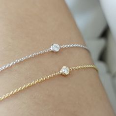 This bracelet has a minimal design, and you can wear it any day and combine it with other jewelry. It makes for an excellent gift for a loved one, without being extravagant. Item Details -Gold Kt:  9K,14K and 18K Solid Gold -We can make all three Gold Colors: Rose Gold, Yellow Gold, White Gold -Dimension Subround set: 3,1mm - 3 Diamonds Weight: 0.03ct -Diamond Clarity: VVS -Diamond Color: F  -Cut: Excellent Each one of our items comes with a guarantee. ✔ Ready to Ship in 7-10 Business Days Please let me know if you need your item by a specific day and I will do everything I can to help you. Thank you for visiting our shop! We really enjoyed creating our designs, and we hope you also enjoyed looking at them. We do everything we can for the best service to our customers. ▶ Want to find out m Minimalist Sterling Silver Diamond Bracelet For Anniversary, Minimalist Bracelet With Bezel Setting For Anniversary, Everyday White Gold Bracelet With Single Diamond, Everyday White Gold Bracelets With Single Diamond, Minimalist Bezel Set Bracelet For Anniversary, Minimalist Silver Diamond Bracelet In 14k Gold, Minimalist Diamond Bracelet With Delicate Chain, Minimalist Single Diamond Bracelet For Anniversary, Minimalist Sterling Silver Bracelet In Diamond White