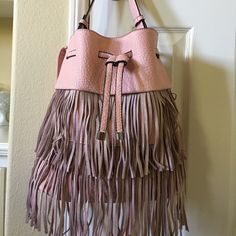 Adorable Pink Oversized Bucket Bag With Fringes. New ,Never Worn. Chic Shoulder Bag With Fringe For Spring, Chic Pink Hobo Bag For Spring, Chic Pink Spring Hobo Bag, Chic Fringe Shoulder Bag For Spring, Pink Shoulder Bag With Removable Pouch For Day Out, Chic Fringed Shoulder Bag For Spring, Chic Spring Shoulder Bag With Fringe, Chic Pink Pouch Hobo Bag, Fringe Bucket Bag For Shopping