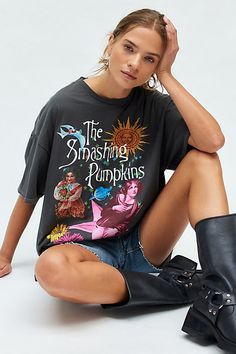 ‘90s-inspired Smashing Pumpkins graphic tee in a vintage, overdye wash. Featuring a Mellon Collie and the Infinite Sadness world tour graphic across the front & back. Perfect as an oversized graphic tee or mini dress. Only at Urban Outfitters. Features Smashing Pumpkins tour t-shirt dress Vintage back graphic tee Overdye fabric for a vintage look and feel Crew neckline with drop shoulders and short sleeves The Smashing Pumpkins tour graphics across the front and back Relaxed, oversized fit Tunic T Shirt Winter Outfit Graphic Tees, Graphic Tshirt Styling, Long Sleeve Under Graphic Tee, Black Oversized Tshirt Outfit, Tshirt Design Ideas Graphic Tees, Alt Shirts, Band Tshirt Outfit, Vintage Tee Outfit, Smashing Pumpkins Shirt