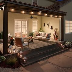 an outdoor living area lit up at night