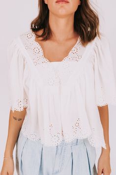 Get ready to make a statement in our FREE PEOPLE Costa Eyelet Top! With its deep v-neckline and eyelet embroidery, this top offers a playful and loose fit. Perfect for adding a touch of fun and quirkiness to any outfit. Details Deep v-neckline Eyelet embroidery Loose fit Sizing Approximate measurements: SIZE LENGTH BUST Small 21" 50" Medium 22" 54" Large 24" 56" XLarge 25" 60" Fabric has no stretchModel is 5’8 wearing small Material 100% CottonHand wash coldHang to dry Casual V-neck Eyelet Blouse, Spring Cotton Lace Top With V-neck, Feminine V-neck Lace Top For Day Out, Cotton Broderie Anglaise Tops For Day Out, Spring Eyelet V-neck Top, Spring V-neck Eyelet Top, Spring V-neck Tops With Broderie Anglaise, Feminine Summer Tops With Eyelet Details, Spring V-neck Eyelet Blouse