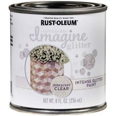 a can of white paint with silver flecks on the bottom and an image of a