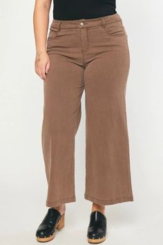 Brown denim wide leg pants These cute high waisted pants are both trendy and comfy! Black colored denim, featuring button and zipper front closure, five pocket design, and wide legs. You will love how great you feel in these babes everyday! True to size fit Stretch level: no stretch, some stretch, very stretchy Model is 5'9" wearing an XL Inseam on size small is 27" High-waisted Button and zipper front closure Five pocket design Wide leg Self: 97% Cotton, 3% Spandex. Lining: 100% Cotton Gentle w Casual Fall Wide Leg Pants With Button Closure, Casual Wide Leg Pants With Button Closure For Fall, Solid Color Wide-leg Jeans For Fall, High Rise Solid Color Cotton Pants, Solid Color Full Length Cotton Flare Jeans, Cotton Wide Leg Jeans In Solid Color, Trendy Brown Wide Leg Flare Jeans, Trendy High Rise Wide Leg Pants, Solid Cotton Flare Jeans For Fall