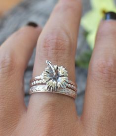 "Hibiscus Flower Rings Set of 3 details below: -Solid .925 sterling silver -Hibiscus measures 13mm x 11mm /Smooth Ring Band 1.2mm width -Choice of stack ring set -A: Boho Floral Band 3mm width/Bead band 1.2mm -B: Floral Leaf Band 3mm width/ Hammered band 1.2mm -Available in US sizes 1-11 with half sizes. *Single Hibiscus Ring here: https://www.etsy.com/listing/832806776/hibiscus-ring-hibiscus-flower-ring?frs=1 Looking for a last minute or unique Christmas gift? Visit our \"READY TO SHIP\" sectio Stackable Flower Promise Rings, Flower Shaped Stackable Promise Rings, Promise Sterling Silver Flower Ring, Sterling Silver Flower Stackable Rings For Wedding, Wedding Stackable Flower Rings In Sterling Silver, Wedding Sterling Silver Stackable Flower Rings, Sterling Silver Flower Shaped Stackable Rings, Silver Stackable Flower Ring, Adjustable Stackable Flower Ring In Sterling Silver