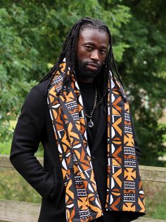 Lovely African print scarf to stay warm during this fall / winter. * Consists of one thick warm anti-pilling fleece layer and one layer of African print fabric (100% cotton) *Adult size: Approximate dimensions: 180cm x 55cm (70 inches x 21 inches) * Washable at 40 degrees Celsius * Unisex Black Cotton Winter Scarf, Black Cotton Scarves For Winter, Black Cotton Scarf For Winter, Brown Cotton Scarves For Fall, African Print Fabric, Scarf Print, Print Fabric, African Print, Winter Scarf