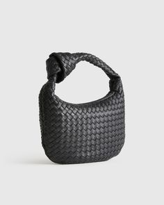 This Italian Leather Handwoven Mini Hobo Bag is a stylish and petite accessory that is your new favorite go-to. Made from high-quality Italian sheep leather, this bag features an artisanal handwoven design handcrafted by women. The mini hobo style is perfect for carrying all your essentials while on the go and with a inner zipper pocket, your belongings will be safe and secure while you stay stylish.  | Quince | Women's Italian Leather Handwoven Mini Hobo Bag in Black Everyday Bags With Top Handle And Interwoven Design, Chic Rectangular Shoulder Bag With Interwoven Design, Everyday Bags With Interwoven Design And Top Handle, Chic Handheld Woven Leather Hobo Bag, Everyday Use Top Handle Hobo Bag With Interwoven Design, Chic Bags With Interwoven Design And Double Handle, Everyday Shoulder Bag With Top Handle And Interwoven Design, Chic Woven Hobo Bag, Rectangular Hobo Bag With Interwoven Design For Everyday