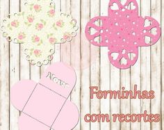 two paper hearts are hanging on a wooden wall with the words formunias com recortes