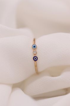 "Gold Evil Eye with Tiny Diamond Ring / Handmade Evil Eye Ring / 14k & 18k Evil Eye Ring Available in Gold, Rose and White Gold ❥ ITEM DETAILS ---> Gold Color of Choice : Yellow Gold, Rose Gold, White Gold ---> Material : 14k ( 585 ) or 18k ( 750 ) Real Gold. It is Not Gold Filled or Gold Plated ---> Made to order ---> Band Thickness : 1.25 mm ---> Band Width : 1.15 mm ---> Evil Eye Made of Enamel ---> Number of Diamond: 1 ---> Diamond Clarity: H Color SI/SI1 Clarity Handmade 14k Rose Gold Rings, Handmade Rose Gold 14k Rings, Stackable 14k Rose Gold Diamond Ring Gift, 14k Rose Gold Stackable Diamond Ring Gift, Halo Rings In 14k Rose Gold As Gift, Adjustable 14k Rose Gold Rings For Gifts, 14k Rose Gold Halo Jewelry Gift, 14k Rose Gold Halo Rings Gift, Halo 14k Rose Gold Rings As Gift