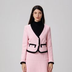 A structured piece with two decorative pockets on the waist, embellished with contrasting piping on the pockets and on the edges of the jacket and cuffs. To wear with the associated skirt: a set that is suitable for professional or semi-formal occasions, for a neat look and a refined style. Main material: 55% Polyester, 45% Wool. Lining: 95% Polyester 5% Elastane. Washing temperature 30° maximum in delicate cycle. Low ironing temperature / bleaching prohibited. Do not tumble dry. Elegant Pink Outerwear With Welt Pockets, Elegant Workwear Blazer With Contrast Trim, Elegant Blazer With Contrast Trim For Work, Fitted Blazer With Contrast Trim For Work, Fall Blazer With Contrast Trim For Work, Spring Workwear Blazer With Contrast Trim, Fitted Blazer With Contrast Trim For Office, Elegant Long Sleeve Blazer With Contrast Trim, Classic Fitted Blazer With Contrast Trim