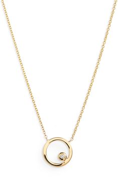 This 14-karat-gold necklace features an open disc pendant glinting with a single bezel-set diamond. 16" length; 2" extender; 1/4" pendant diameter Total diamond weight: 0.01ct. Color: G-H Clarity: SI 14k gold/diamond Imported >Diamond Guide Modern Charm Necklace With Round Pendant And Adjustable Chain, Modern Charm Necklace With Adjustable Chain And Round Pendant, Modern Yellow Gold Charm Necklace With Adjustable Chain, Modern Charm Necklaces With Adjustable Chain And Round Pendant, Circle Shaped Yellow Gold Necklace With Adjustable Chain, Modern Round Diamond Necklace With Adjustable Chain, Elegant Round Charm Necklace With Cable Chain, Yellow Gold Open Circle Jewelry With Adjustable Chain, Gold Open Circle Necklace