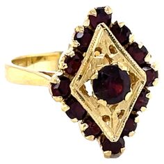 Gold Marquise Ruby Ring, Elegant Marquise Gold Ruby Ring, Elegant Faceted Ruby Ring In Yellow Gold, Marquise Ruby Ring In Yellow Gold, Elegant Yellow Gold Faceted Ruby Ring, Gold Marquise Ruby Ring Hallmarked, Gold Marquise Ruby Ring With Hallmark, Vintage Red Marquise-cut Jewelry, Vintage Red Marquise Cut Jewelry