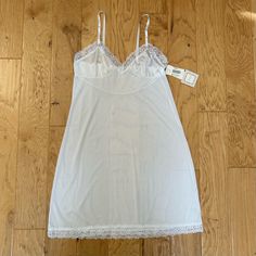 Vintage Sears Intimate Essentials Slip Dress In Size 36 White Poly & Lace Adjustable Ribbon Like Straps New With Tags Measures About Armpit 17” Length 26” Underbust To Hem Never Worn But Has Dirty Mark As Shown In Last Image Ships Same Day Smoke Free Pet Free Tag , Sear’s & Roebucks Retro Mcm Night Gown Sleep Wear Fitted Sheer White Nightgown, White Sheer Fitted Nightgown, Fitted White Chemise For Loungewear, White Fitted Chemise For Loungewear, Fitted White Chemise For Sleep, White Fitted Chemise For Sleep, Fitted White Chemise For Wedding Night, White Fitted Chemise For Wedding Night, Fitted Sheer White Chemise