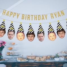 a birthday banner with photos of people wearing party hats and glasses on it in front of a table full of food