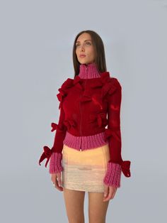 Made to order. Ships in 1 to 3 weeks A beautiful women's knit sweater with matching bows and contrasting cuffs, hem, and collar in lovely pink and vibrant red. The sweater includes a matching zipper in the middle. Each piece takes up to 5 days to knit, ensuring uniqueness with slight variations. Made of acrylic, mohair, and wool for a comfortable and stylish ensemble. Note: All sweaters are hand-knitted by our team of local women workers. All of our workers are paid a fair living wage, not just Lirika Matoshi, Winter Knitwear, Womens Knit Sweater, Bow Sweater, Knitting Women, Long Sleeve Cardigan, Cardigans For Women, Knit Cardigan, Fashion Inspo Outfits