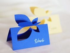 a blue box with a yellow bow on it