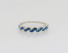 Vintage Sterling Silver Blue Opal Ring ...Marked 925...Total of weights 1.8grams...Size 7...Measure of Face 3.8MM...It's in very good condition. Formal Blue Stackable Rings, Blue Round Stackable Rings For Formal Occasions, Formal Blue Sterling Silver Stackable Rings, Blue Sterling Silver Round Band Jewelry, Blue Sterling Silver Stackable Rings With Round Band, Blue Sterling Silver Opal Promise Ring, Elegant Blue Opal Ring Stamped 925, Blue Sterling Silver Stackable Jewelry, Blue Opal Ring Stamped 925 For Gift