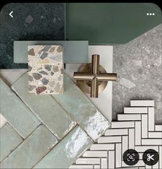 a cross on the wall next to some tiles and a sink with a faucet