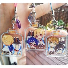 two key chains with anime characters on them and the words 2 for $ 16 written below