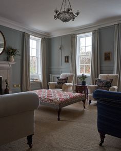 an instagram photo of a living room with furniture and decor on the bottom right hand corner