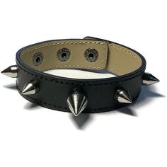 This genuine black leather cuff bracelet is 3/4 inch (18mm) wide by 8 inches long.  I have added spike studs down the center just like the pictures show with a larger profundity one in the middle. It has a 3 snap closure which allows it to be adjusted to fit a wrist size from 5 1/2  to 7 inches around. Also available in a 9 inch length which can fit a wrist from 6 1/2 inches to 8 inches. ----------------------------------------------------- Thanks so much for looking! Black Leather Cuff Bracelet, Spike Bracelet, Black Leather Bracelet, Leather Cuff Bracelet, Nickel Plating, Bracelet Leather, Leather Cuffs Bracelet, Bracelet Cuff, Leather Cuffs