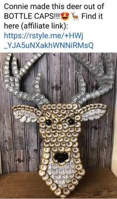 a deer head made out of bottle caps