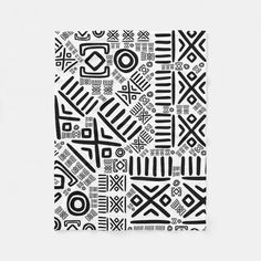 an abstract black and white pattern on a wall