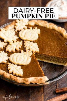 a pumpkin pie with the words homemade dairy - free pumpkin pie on top and an image of